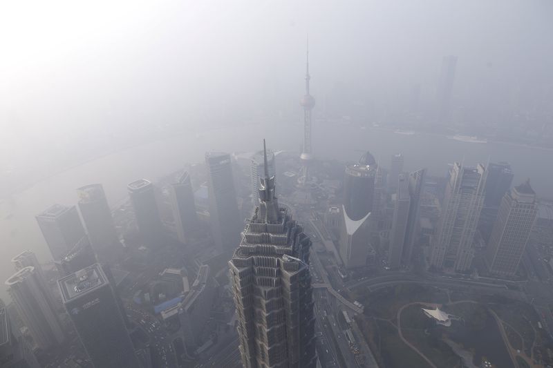 A general view of Shanghai's financial district of Pudong as seen from the Shanghai World Financial Center amid heavy smog in Shanghai China. – Reuters pic