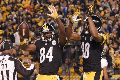 Pittsburgh Steelers wide receiver Antonio Brown celebrates his touchdown with Darrius Heyward Bey during the second half of an NFL football game in Pittsburgh Sunday Dec. 20 2015