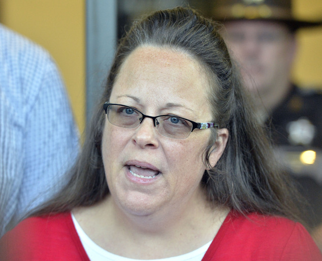 Rowan County Clerk Kim Davis makes a statement to the media at the front door of the Rowan County Judicial Center