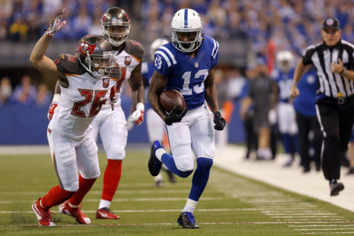 Nov 29 2015 Tampa Bay Buccaneers corner back Sterling Moore goes to swat the ball away from Indianapolis Colts Wide Receiver T.Y. Hilton  during the football game between the Tampa Bay Buccaneers at Indianapolis Colts at Lucas Oil Stadiu