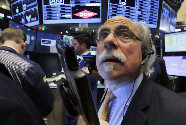 Trader Peter Tuchman at the New York Stock Exchange. Some big gainers were big losers Tuesday