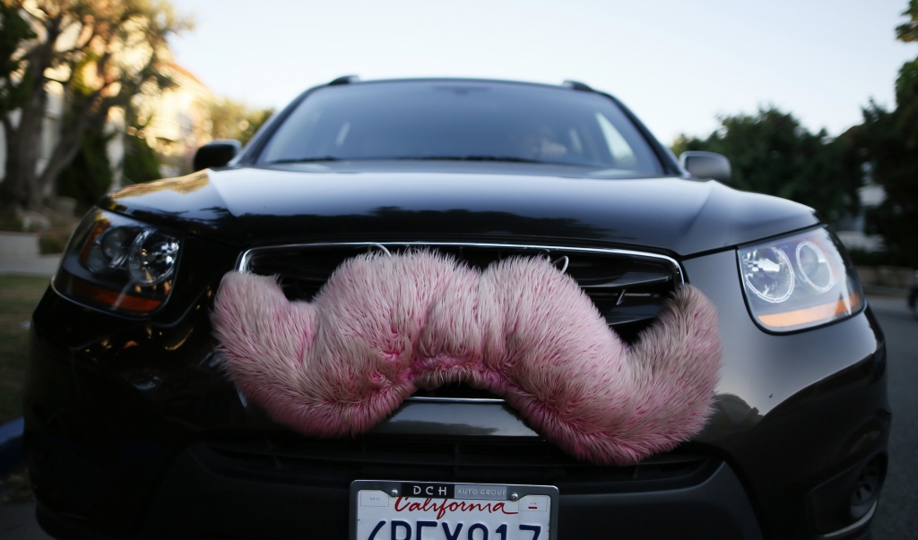 A driver with the ride-sharing service Lyft waits for a customer in Santa Monica California in October 2013. Lucy Nicholson  Reuters