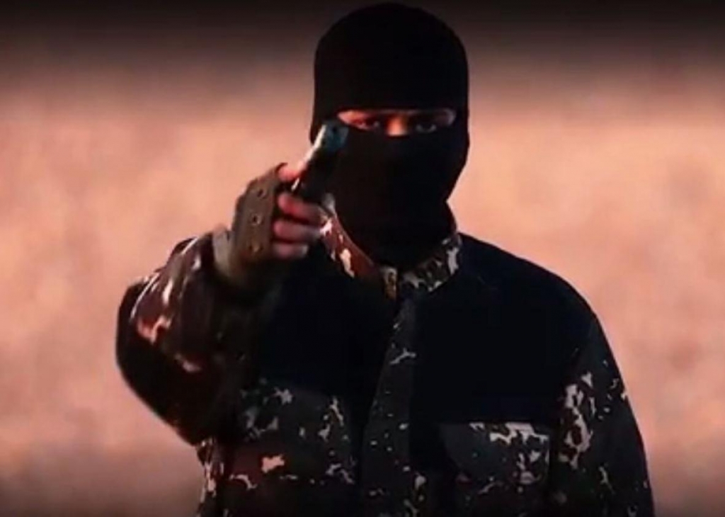 A screen capture from the video that was circulating online on Jan. 3 2015 shows the masked jihadi who has a British-sounding accent