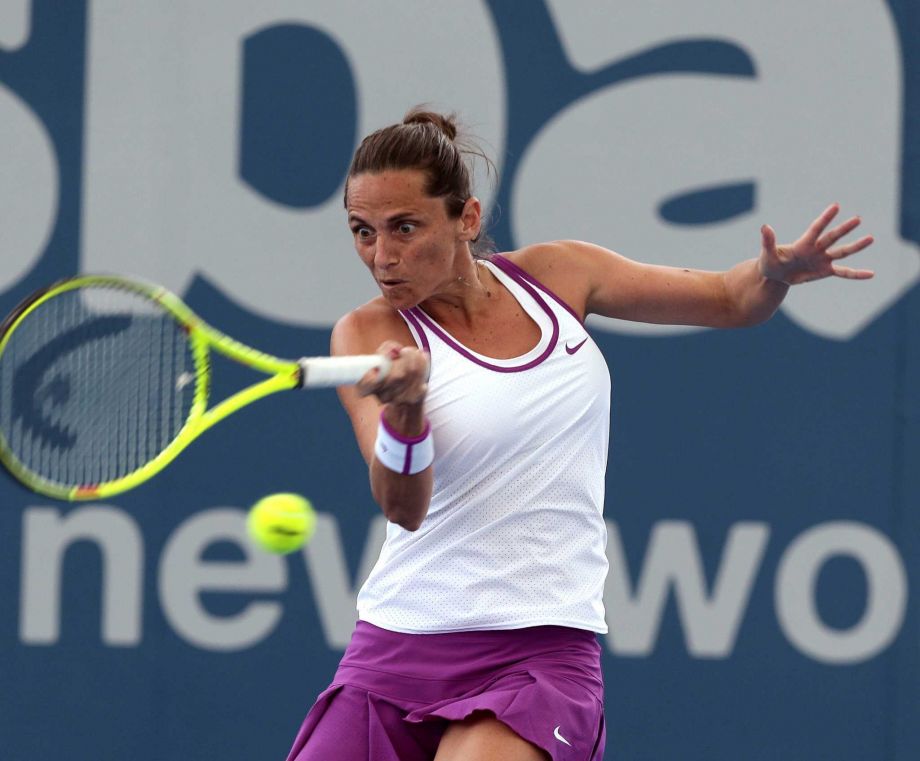 Roberta Vinci of Italy plays a shot in her match against Dominika Cibulkova of Slovakia during the Brisbane International tennis tournament in Brisbane Australia Tuesday Jan. 5 2016