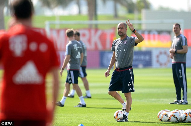 Bayern Munich's head coach Pep Guardiola leads his team's training session in Qatar on Friday