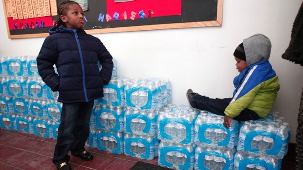 Kids with stacked water Flint