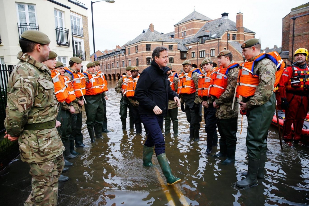 David Cameron visits soldiers working on flood relief in York city centre PA