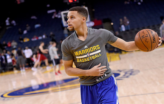 OAKLAND CA- DECEMBER 25 Stephen Curry #30 of the Golden State Warriors warms up prior to playing the Cleveland Cavaliers in an NBA basketball game at ORACLE Arena