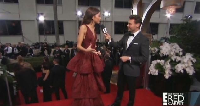 Zendaya is interviewed by Ryan Seacrest on the Red Carpet of the 2015 Golden Globe Awards