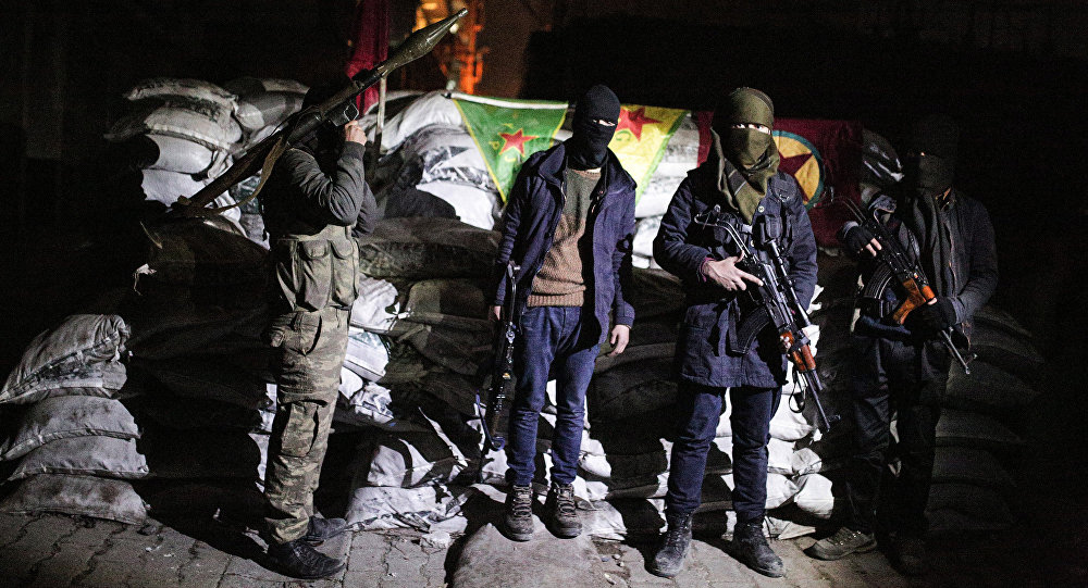 Militants of the Kurdistan Workers Party or PKK stand at a barricade in Sirnak Turkey