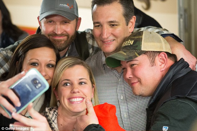 Iowa campaign stop Jenny Rahlf makes a selfie along with her husband Jon Rahlf, Ashley Headington, Headington's husband Curt Headington and Republican presidential candidate U.S. Sen. Ted Cruz at a campaign event in Iowa wher