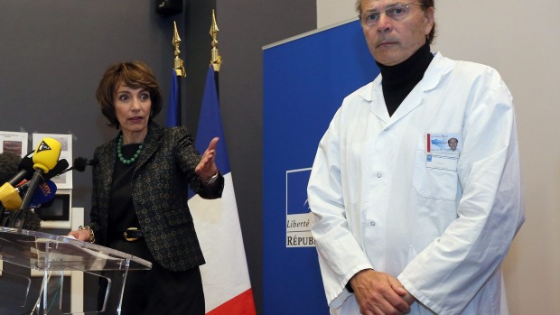 French Health Minister Marisol Touraine left and Professor Gilles Edan the chief neuroscientist at Rennes Hospital