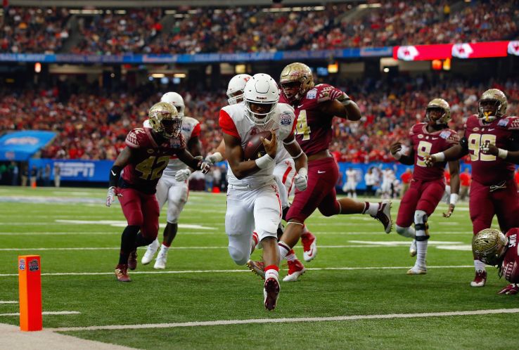 Greg Ward Jr. #1 of the Houston Cougars runs 7-yards to score a touchdown in the second quarter against the Florida State Seminoles during the Chick-fil-A Peach Bowl at the Georgia Dome