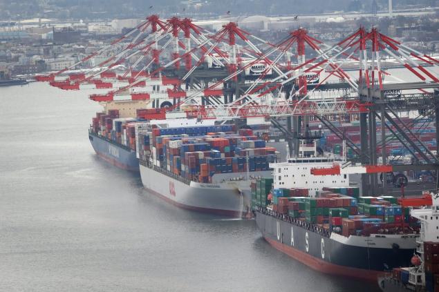 The unloading of ships ground to a halt after the 11 a.m. walkout with lines of waiting trucks left stranded along the waterfront on both sides of the Hudson River