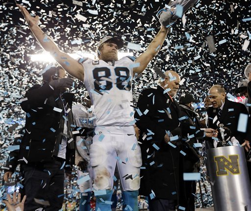 Carolina Panthers Greg Olsen celebrates after the NFL football NFC Championship game against the Arizona Cardinals Sunday Jan. 24 2016 in Charlotte N.C. The Panthers won 49-15 to advance to the Super Bowl