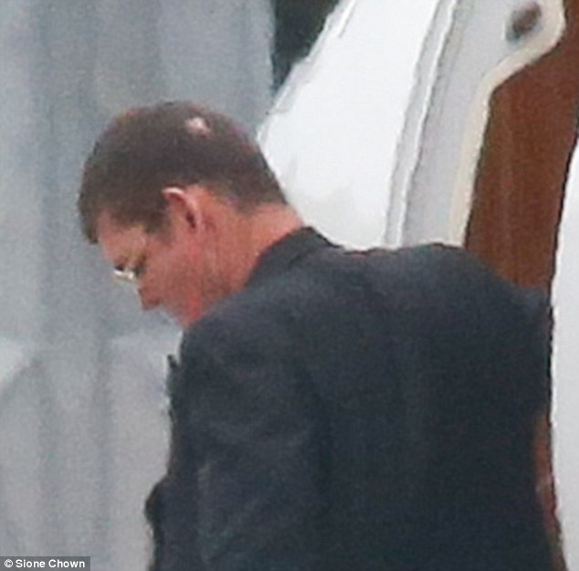 Hard to miss Mariah Carey was nowhere in sight as James Packer touched down in Sydney on Sunday afternoon but the curious bald patch he's been sighted with over recent weeks was still very much in evidence