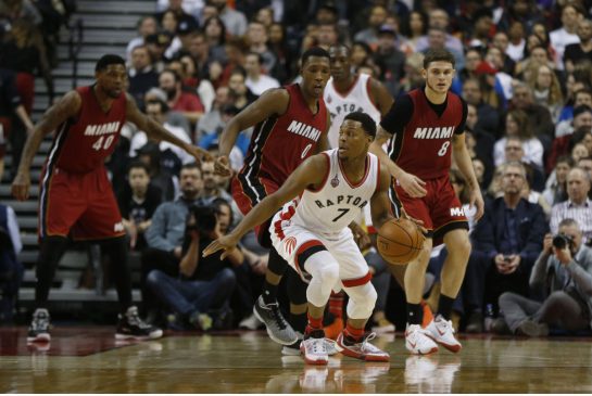 The Raptors Kyle Lowry looks for an outlet during first-half play against the Miami Heat on Friday night at the ACC