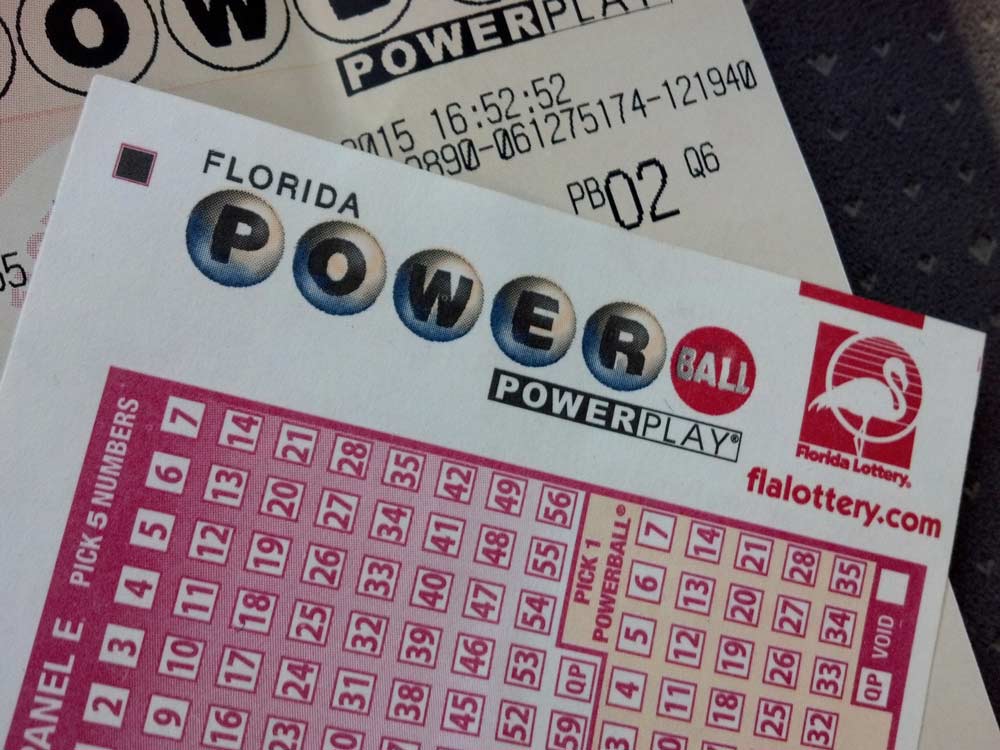 Powerball ticket and play card