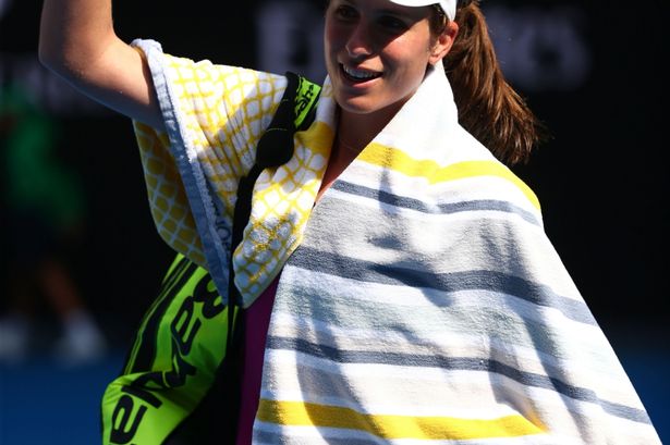 End of the run Johanna Konta of Great Britain waves to the crowd after losing her Australian Open semi-final against Angelique Kerber of Germany