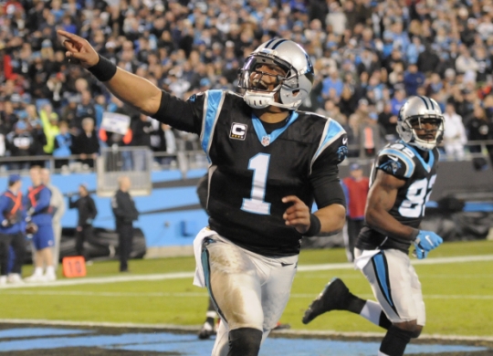 Carolina Panthers quarterback Cam Newton celebrates a touchdown against the Tampa Bay Buccaneers in the first half of an NFL football game in Charlotte N.C. Sunday Jan. 3 2016