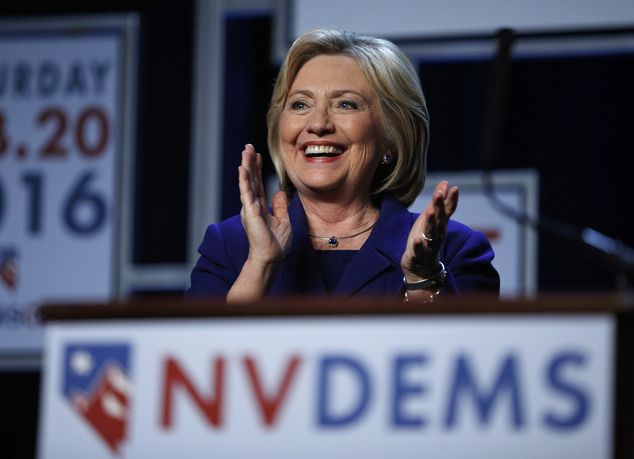 Democratic presidential candidate Hillary Clinton stands on stage at the Battle Born Battleground First in the West Caucus Dinner Wednesday Jan. 6 2016