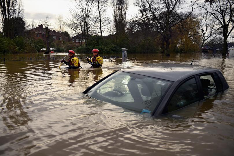 UK military helps combat flooding as it spreads to cities