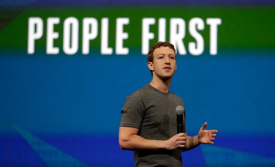 Facebook CEO Mark Zuckerberg gestures while delivering the keynote address at the f8 Facebook Developer Conference in San Francisco.&nbsp