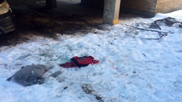 What was left at the scene beneath an apartment that caught fire forcing a man and woman with a baby to jump from a window on New Year's Day