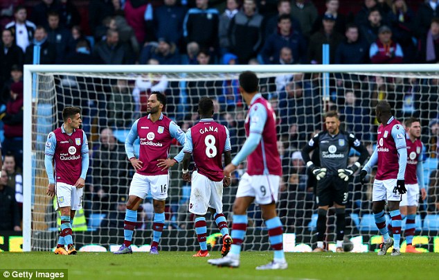 Aston Villa players look perplexed by their struggles during a 6-0 home demolition by Liverpool