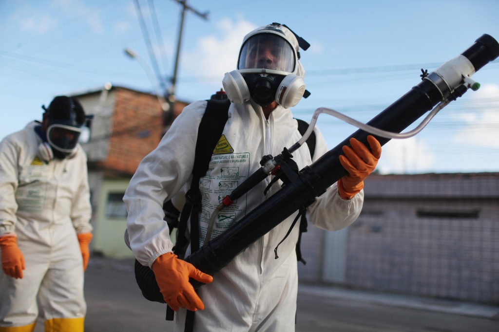 Health workers fumigate in an attempt to eradicate the mosquito which transmits the Zika virus in Recife Pernambuco state Brazil