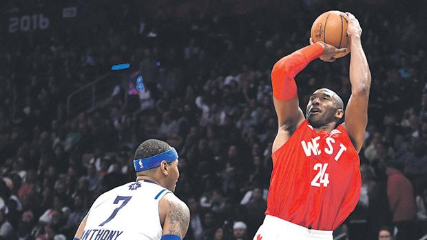 Kobe Bryant attempts a shot during the All Star Game in Toronto