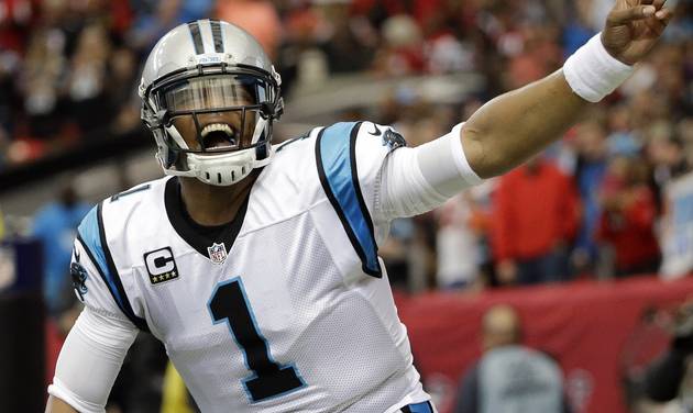 Carolina Panthers quarterback Cam Newton celebrates his touchdown against the Atlanta Falcons during an NFL football game in Atlanta. Newton's spectacular season has earned him The Associated Press NFL Offens