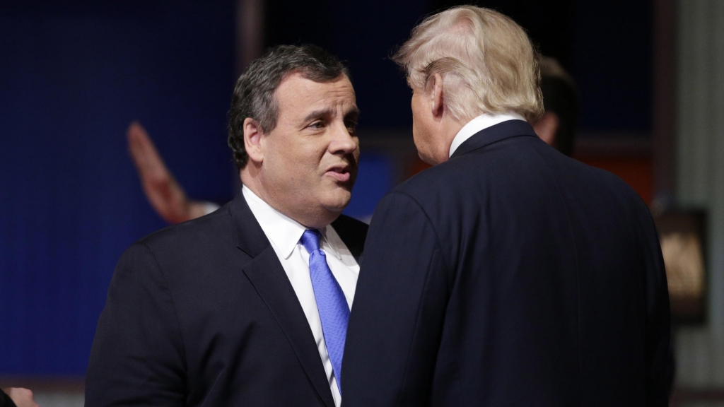 Chris Christie with Donald Trump at a presidential debate last month