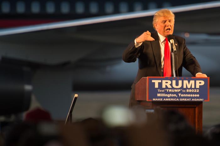 Republican presidential candidate Donald Trump addresses a rally at Millington Regional Jetport