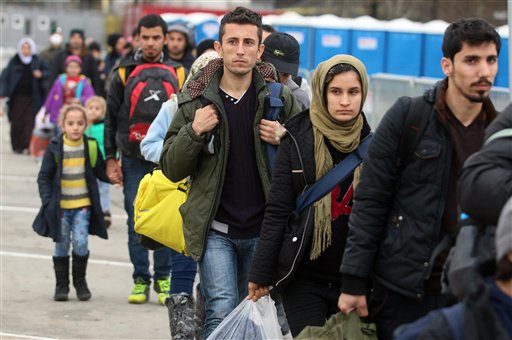 Struggle for life Migrants walk between registration tents at the border to Slovenia in Spielfeld Austria Tuesday. Austria’s interior minister Johanna Mikl Leitner said the country plans to extend border controls to Italy as it plans for possible shi