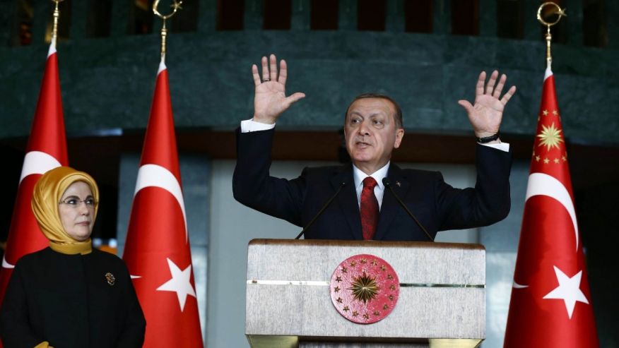 Feb. 9 2016 Turkish President Recep Tayyip Erdogan right addresses a reception next to his wife Emine Erdogan at his palace in Ankara Turkey