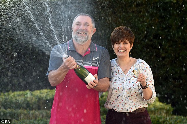 Financial fizz Gerry and Lisa Cannings celebrate winning £32.5million