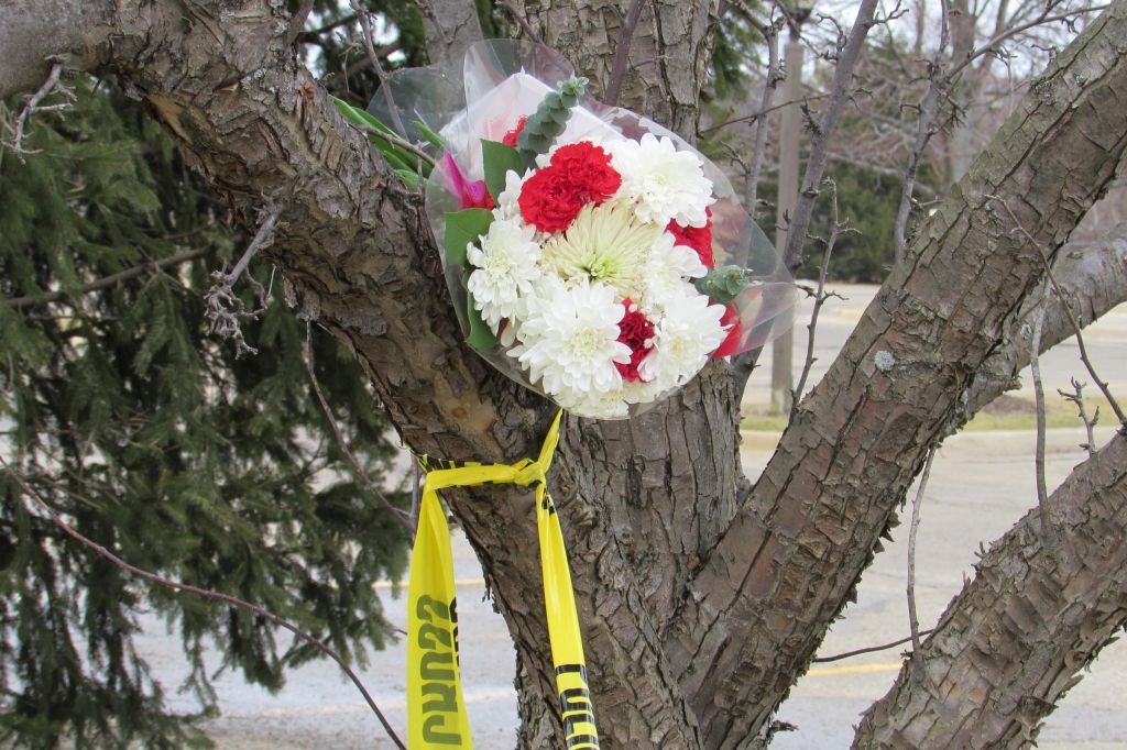 Flowers left at one scene of Kalamazoo shooting spree Saturday