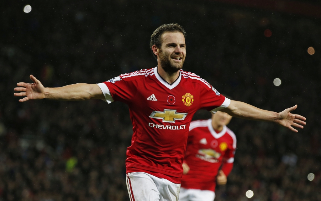 Manchester United's Juan Mata celebrates scoring their second goal during the Barclays Premier League game against West Bromwich Albion at Old Trafford