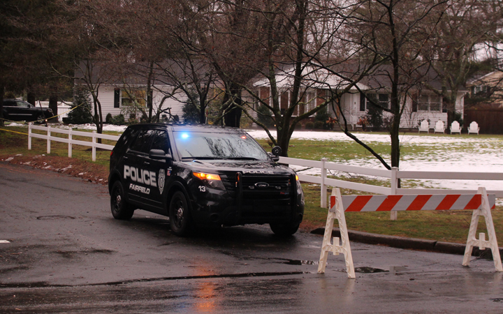 Fairfield Police guard the house at 22 Mountain Laurel Road where an officer fatally shot 51-year-old Christopher Andrews after Andrews allegedly attacked his wife and children Tuesday Feb. 16. — John Kovach