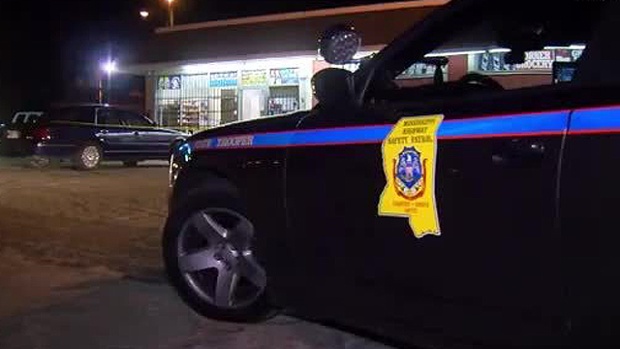 Masked men shoot police officer during robbery