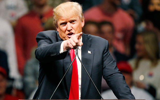 Republican presidential candidate Donald Trump speaks with members of the media during a news conference Tuesday Feb. 2 2016 in Milford N.H