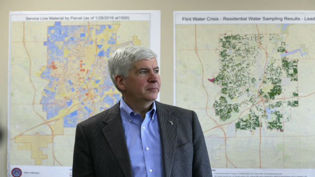 Michigan Gov. Rick Snyder addresses the media Thursday Feb. 18 2016 in Flint Mich. The Michigan House approved $30 million on Thursday to help pay Flint residents’ water bills in the aftermath of the city’s lead-contamination crisis (AP