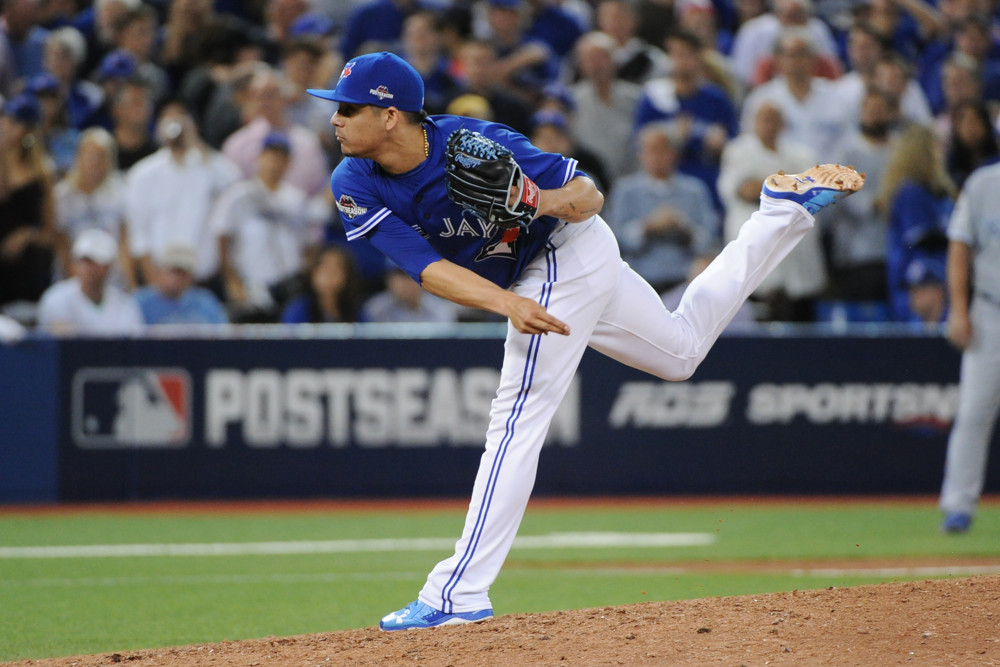 Toronto Blue Jays Pitcher Roberto Osuna  pitches during ALCS Game 5 between the Kansas City Royals and Toronto Blue Jays at Rogers Centre in Toronto ON