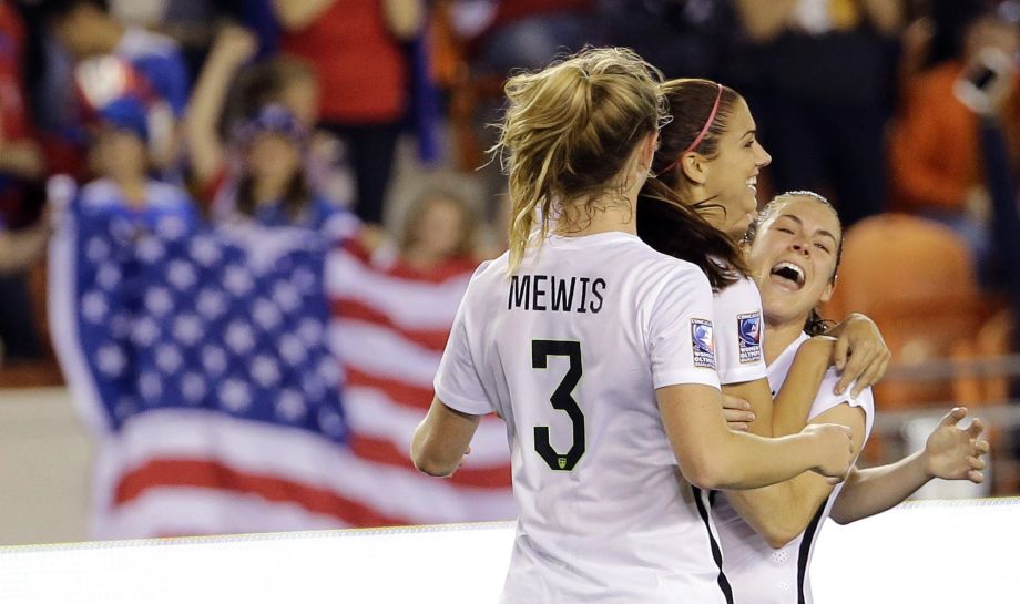 Alex Morgan center celebrates her goal with Samantha Mewis and Kelley O'Hara of the U.S