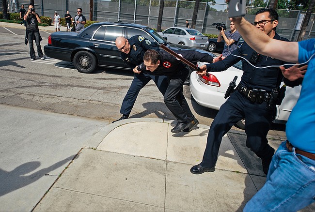 Police: 3 counter-protesters stabbed at KKK rally in Anaheim, several arrested