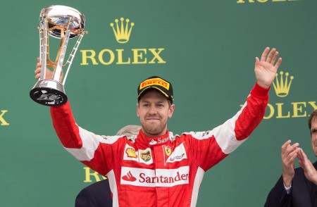 Oct 25 2015 Austin TX USA Ferrari driver Sebastian Vettel of Germany waves to the crowd after finishing in third place in the United States Grand Prix at the Circuit of the Americas. Mandatory Credit Jerome Miron-USA TODAY Sports