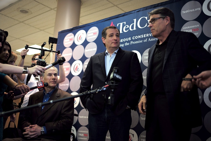 Ted Cruz flanked by Gov. Greg Abbott and former Governor Rick Perry campaigns in San Antonio a day ahead of Super Tuesday Feb 29 2016