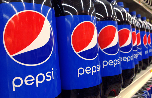 Pepsi bottles are on display at a supermarket in Haverhill Mass. Pepsi Co reports financial results on Monday April