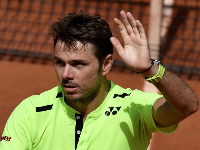 Stanislas Wawrinka celebrates after winning his second-round match against Taro Daniel at the French Open in Paris